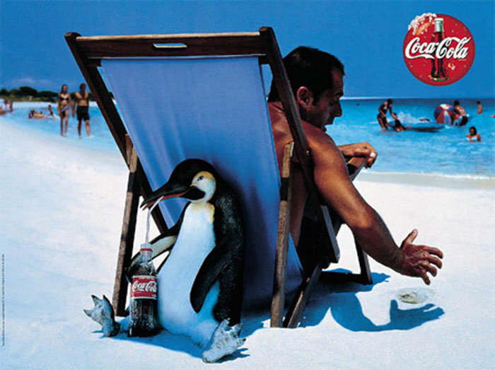 Penguin enjoying Coca-Cola Print Advertisement